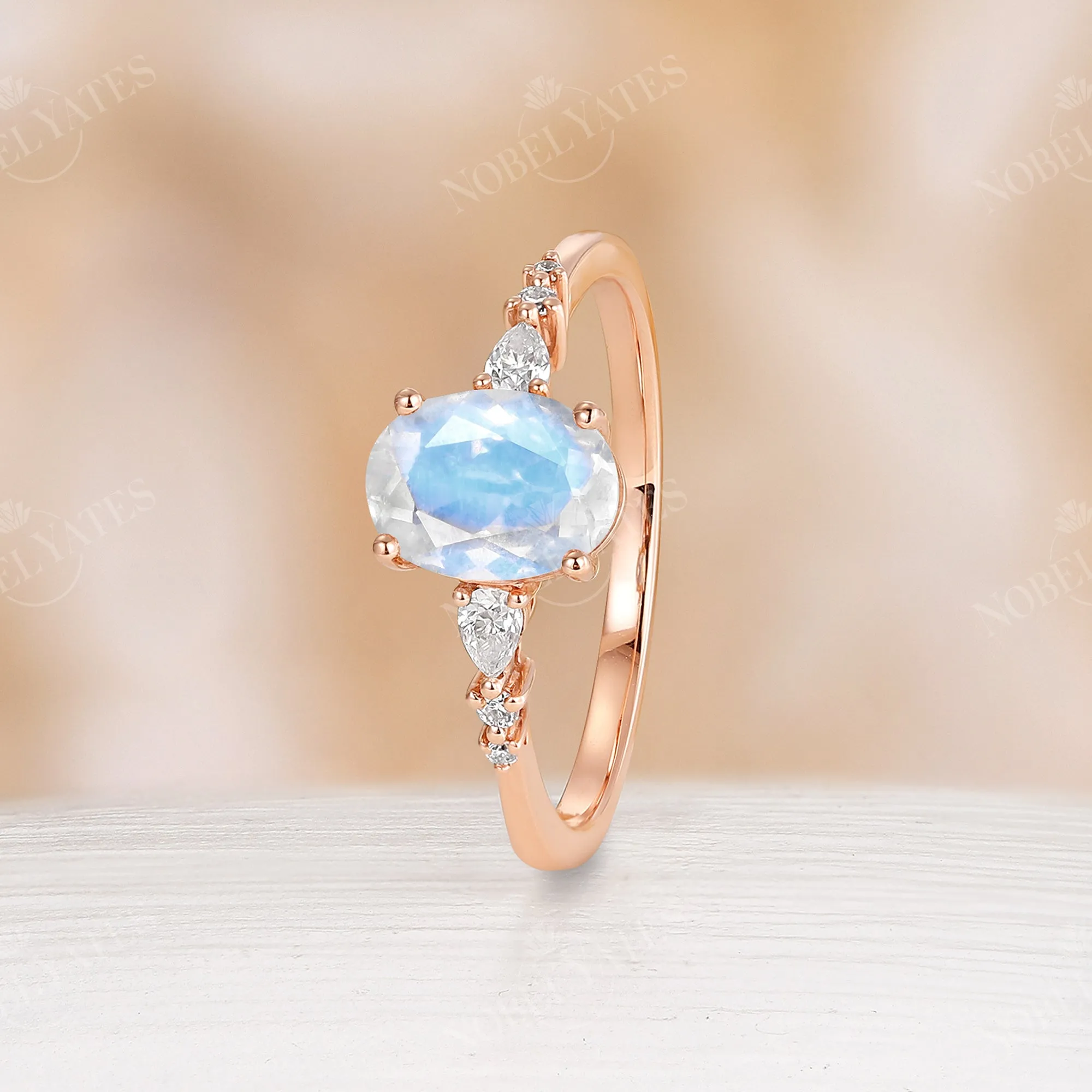 Classic Oval Blue Moonstone Moissanite Side Stone Engagement Ring