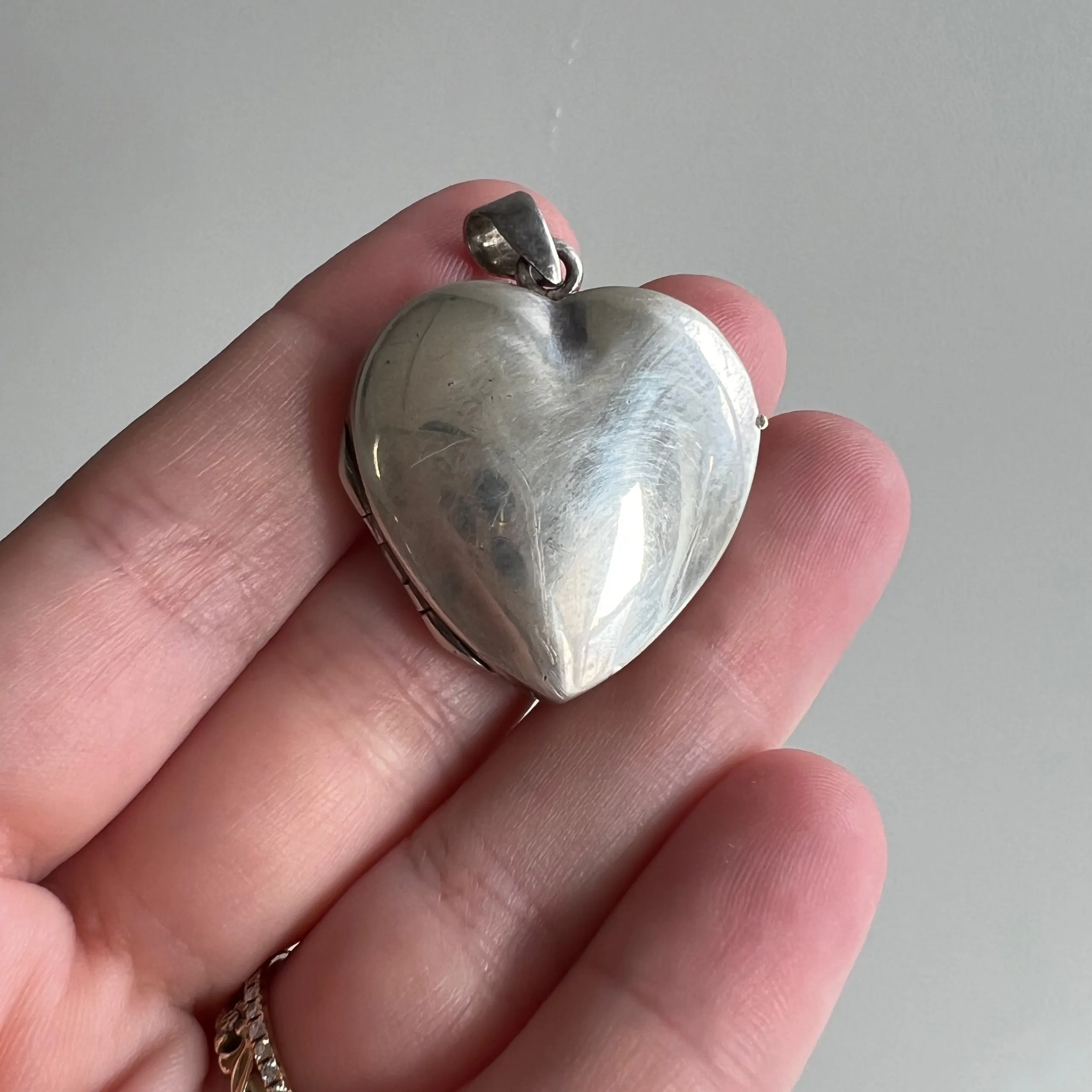 P R E - L O V E D  // no heart is simple / sterling silver slightly puffy heart locket / a pendant