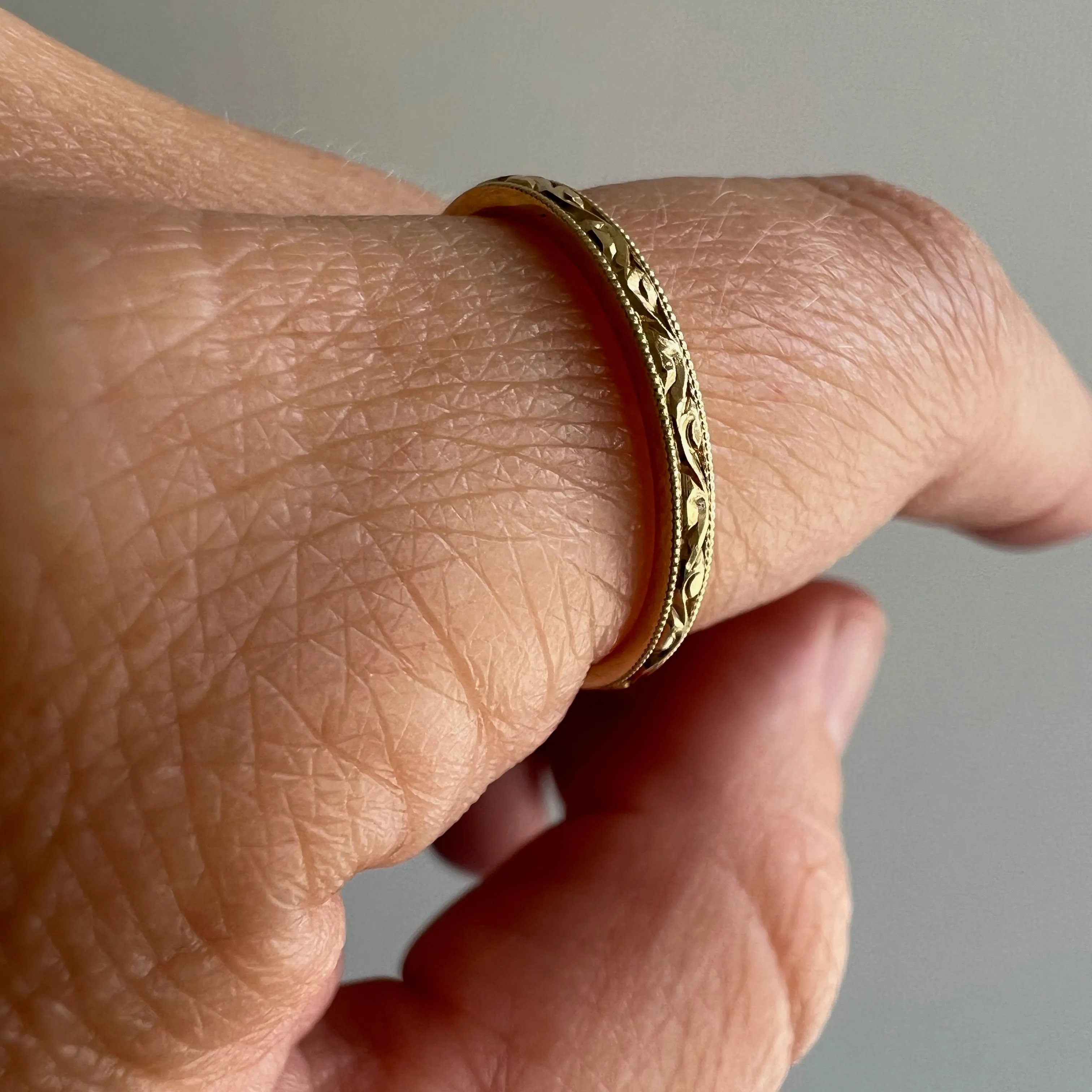 P R E - L O V E D // tiniest paisleys / 14k yellow gold skinny stacking band / size 7