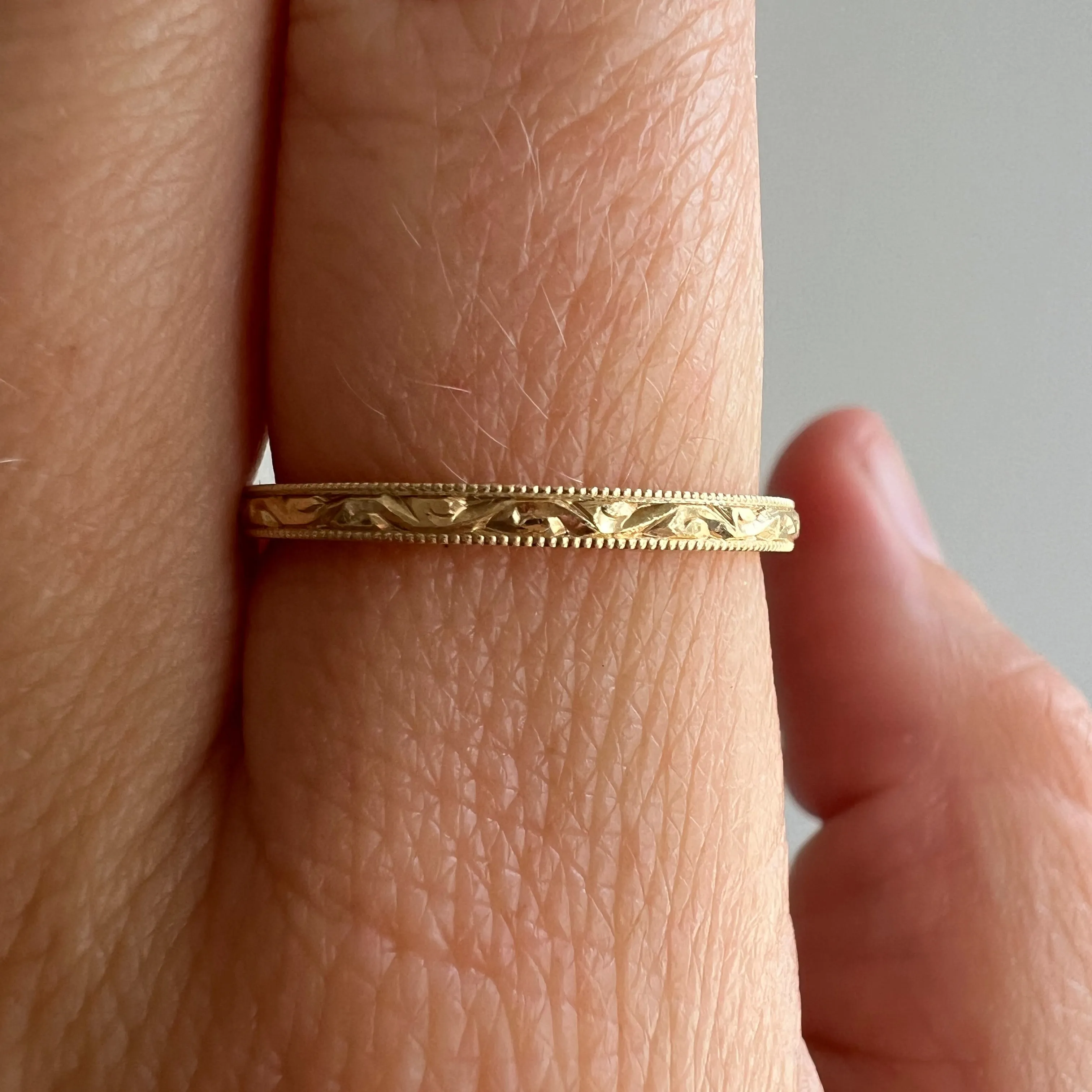 P R E - L O V E D // tiniest paisleys / 14k yellow gold skinny stacking band / size 7